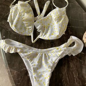 Plumeria swim bikini top is 32-34 DD, bottom L